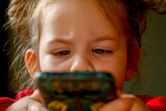 Mobile-phones-are-becoming-dangerous-for-children-in-a-colorful-world